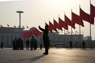 China stocks trade higher as annual parliamentary meeting ends